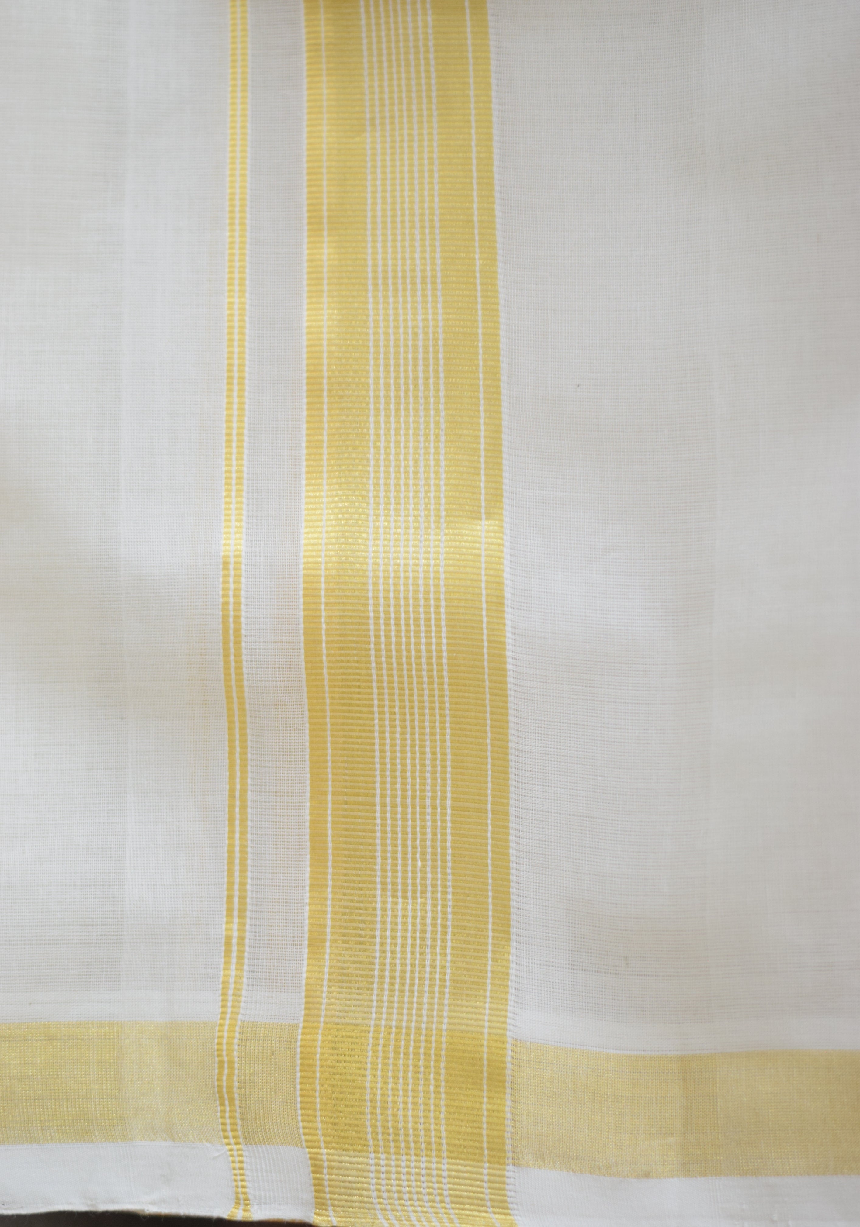 Traditional White Cotton Dhoti with Golden Border. Bouble.