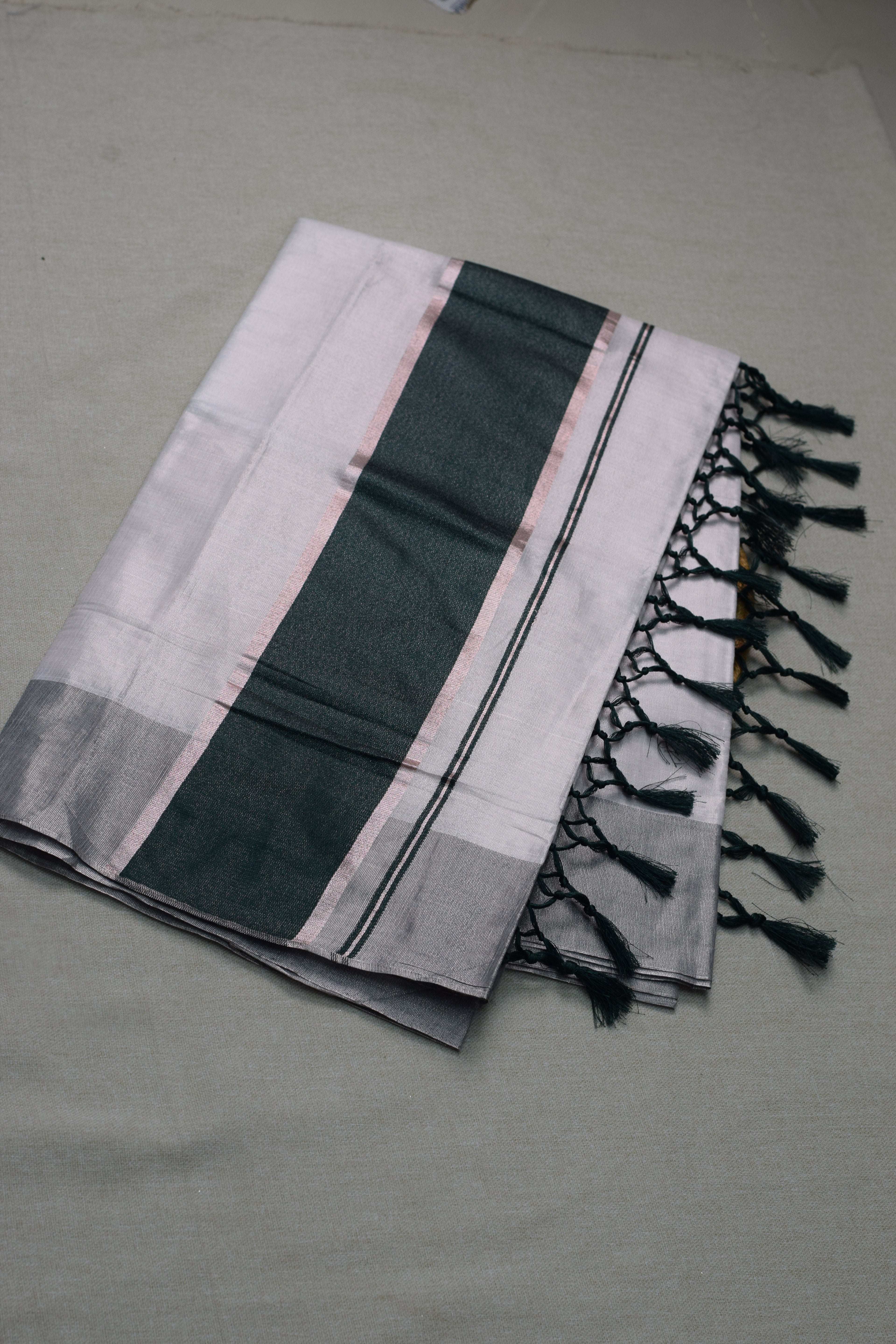 White &amp; Green Kerala Tissue Set Saree with Silver Border & Tassels