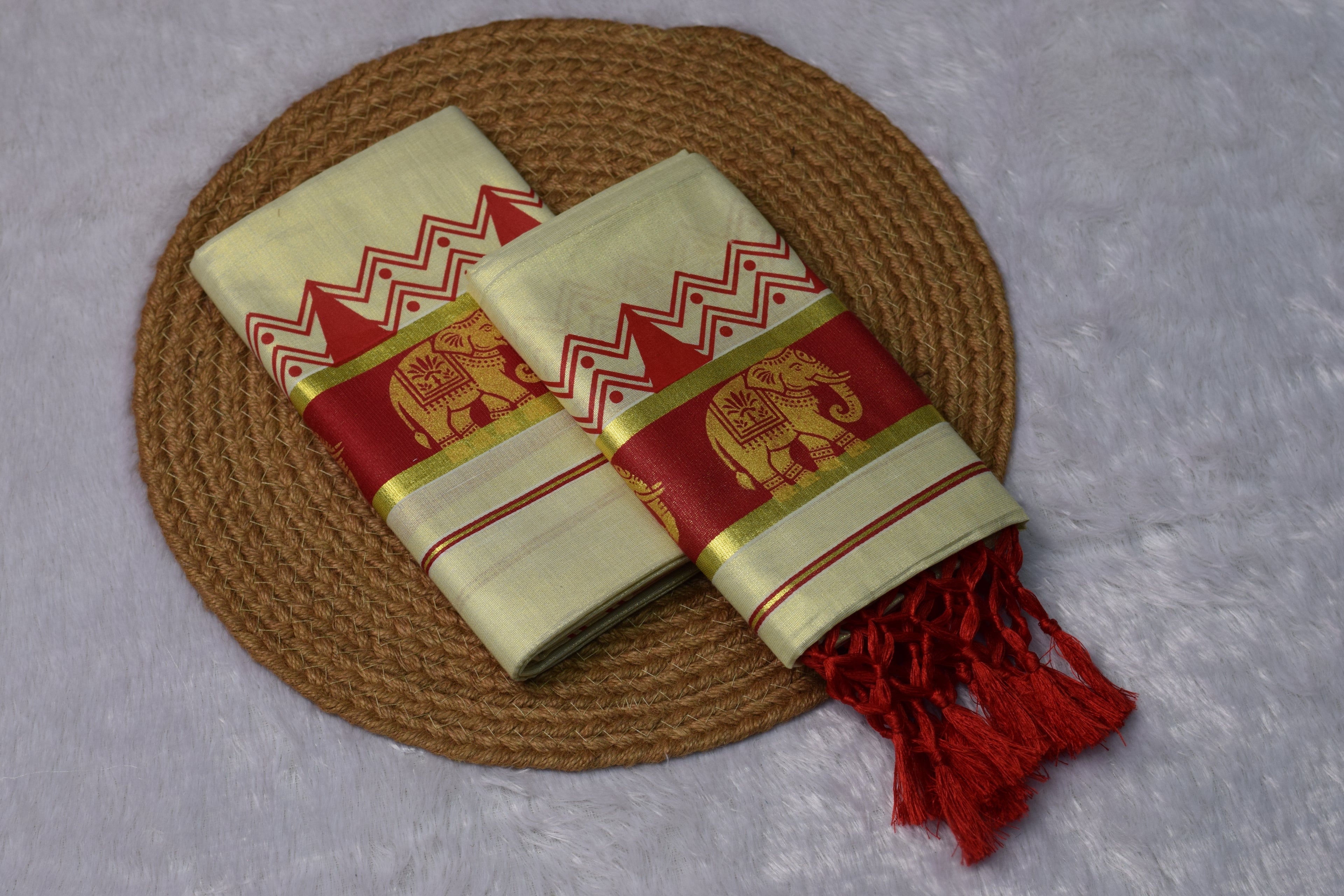 Kerala Kasavu Set Mundu with Red Elephant Border & Tassel Design - Main Product Image - Nushio