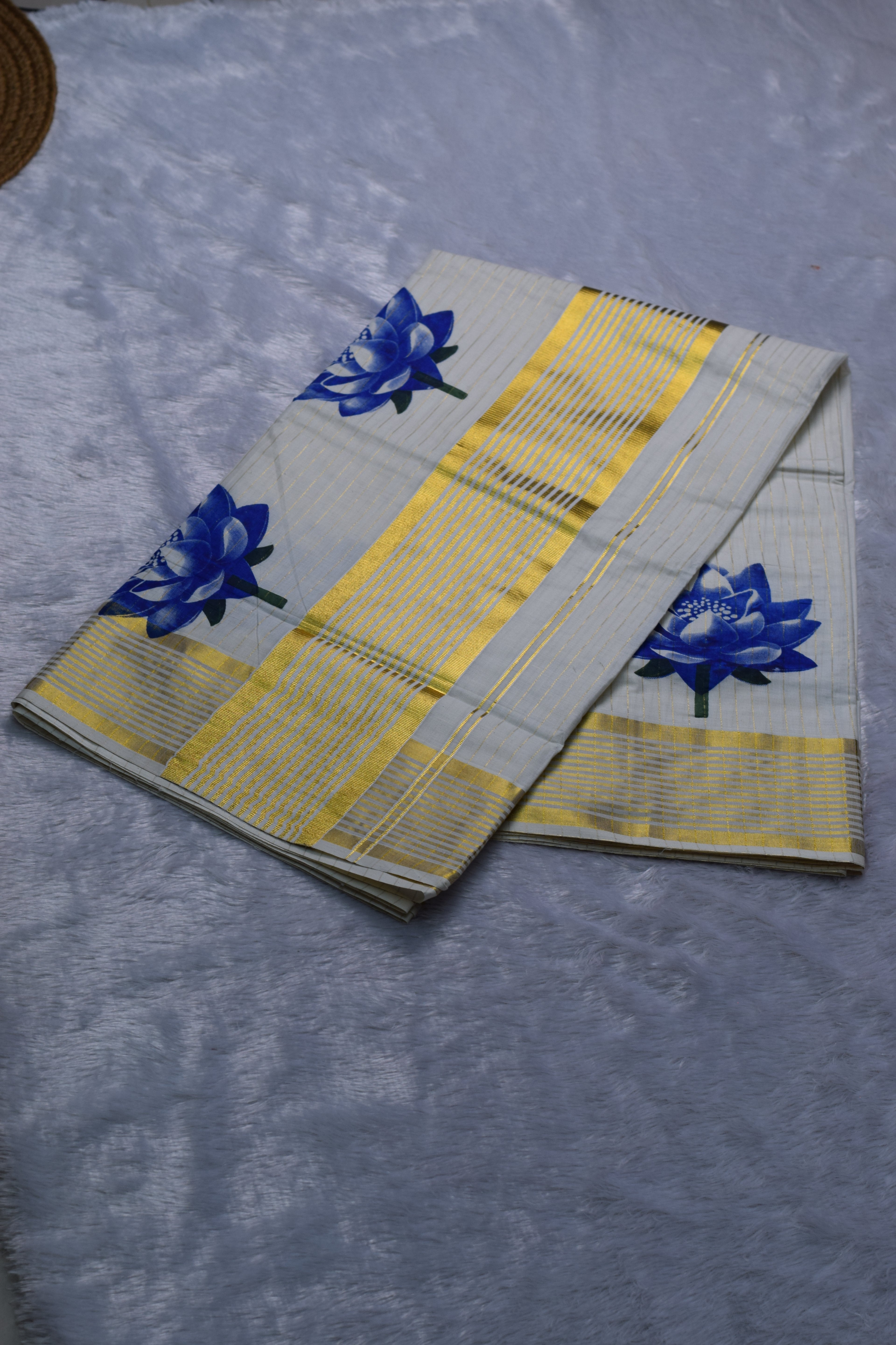 Kerala Kasavu Set Saree with Blue Floral Print & Golden Border