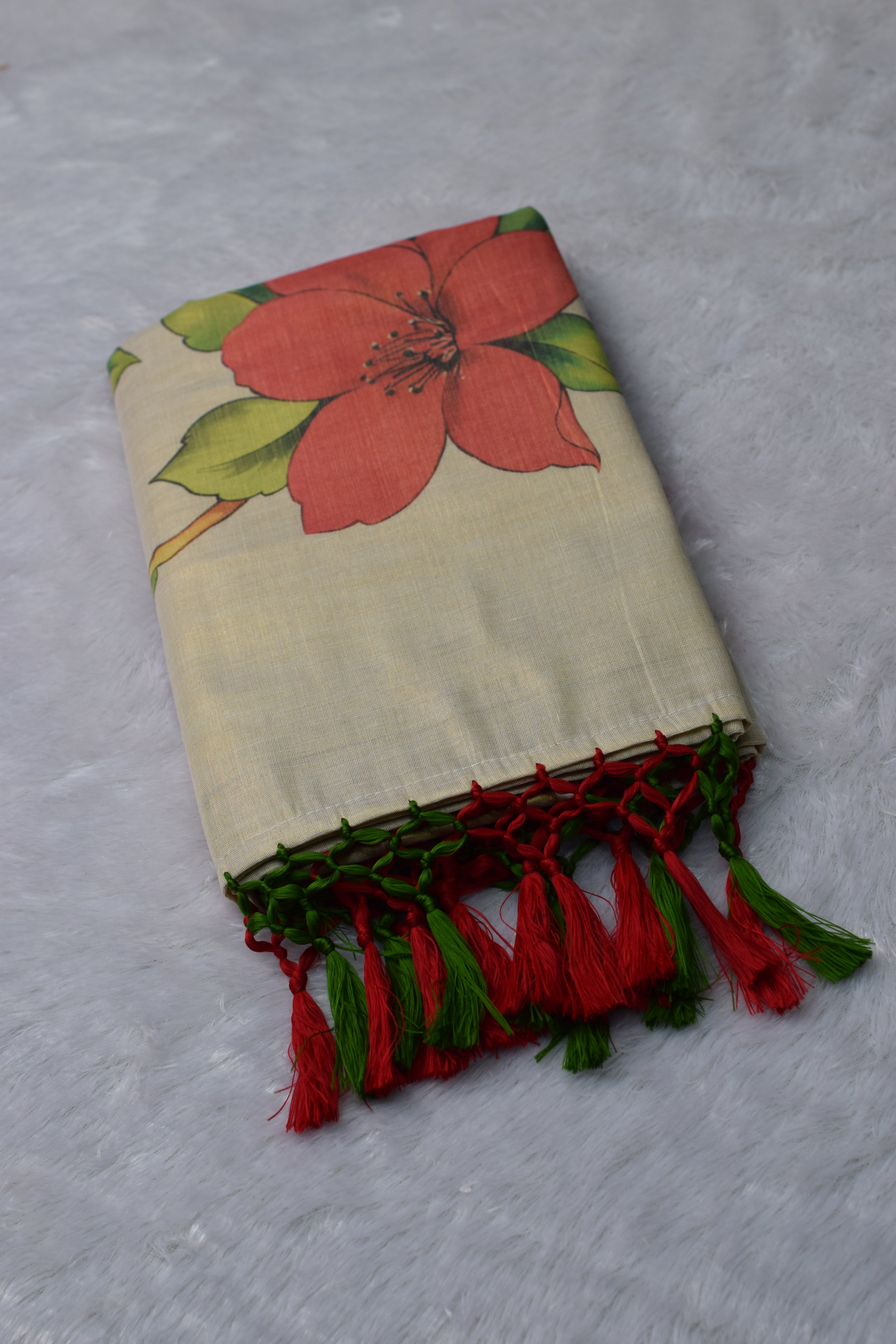 Cream Floral Saree with Golden Border & Tassel Pallu | Nushio